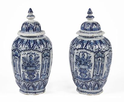null DELFT

Pair of covered earthenware potiches with octagonal body decorated in...