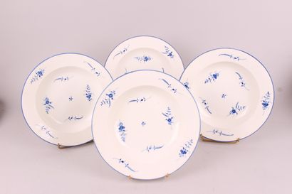 null CHANTILLY

Four soft porcelain soup plates with blue camaïeu decoration of flowering...