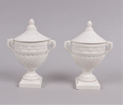 null MENNECY

Pair of small covered baluster vases in soft bisque porcelain with...