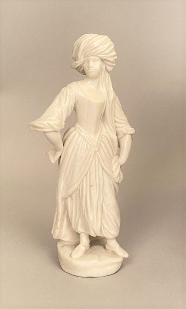 null NAPLES

A white enamelled porcelain statuette representing an oriental woman...