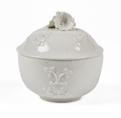 null CHANTILLY

A white enamelled soft porcelain covered sugar pot decorated with...