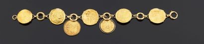null Bracelet articulé en or jaune 750 millièmes et métal orné de pièces en or, certaines...