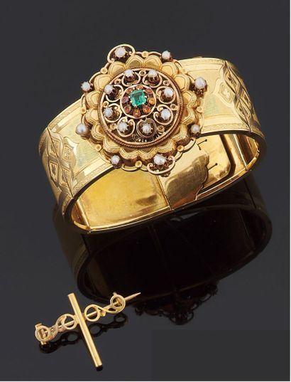null Bracelet large articulé en or jaune 750 millièmes partiellement gravé, décoré...