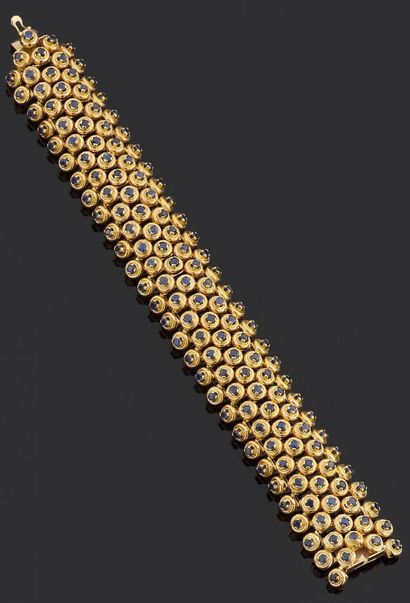 Bracelet ruban articulé en or jaune 750 millièmes...