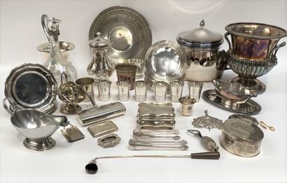 null SET IN SILVER METAL including goblets, a crystal carafe, a sauceboat, a teapot,...