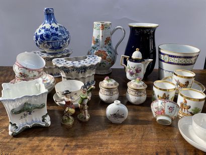 null A set of various ceramics based on 18th century models including cups, saucers,...