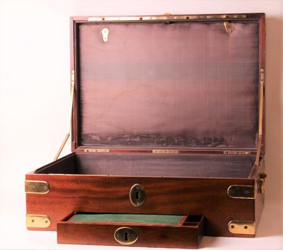null A mahogany navy chest with two side handles and brass fittings, opening on an...