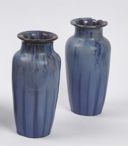 null SCHOOL OF CARRIES

Two stoneware vases with a shouldered ovoid body, one with...