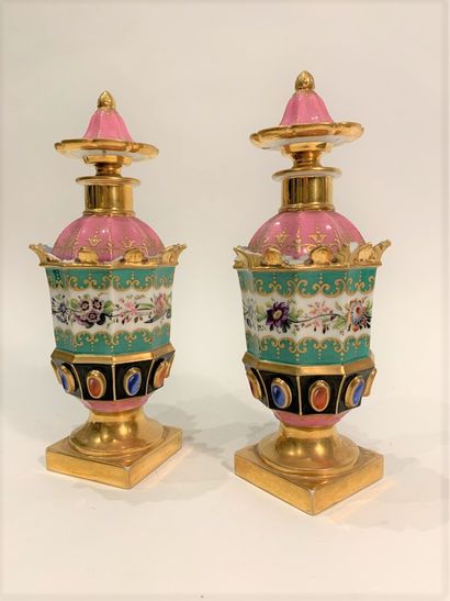 null PARIS 

Pair of porcelain covered vases with cut sides, with polychrome floral...