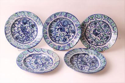 null GRANADA, SPAIN

Set of four soup plates and a dinner plate in earthenware decorated...