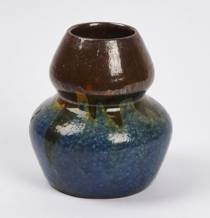 null SCHOOL OF CARRIES 

A stoneware ovoid vase with a shoulder and bulging neck,...