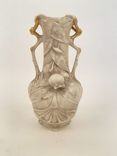 null Bohemia (Royal Dux)

Porcelain vase of baluster form with two handles resting...