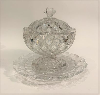 p A moulded glass covered drageur with diamond-cut decoration resting on a poly-lobed...