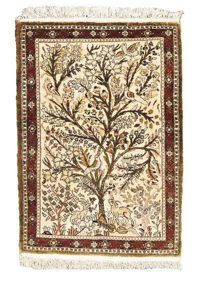 null SMALL FLOOR CARPET in wool and silk decorated with a tree of life. 

86 x 59...