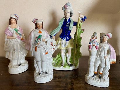 null STARFFORDSHIRE

Set of four polychrome earthenware figurines featuring characters,...