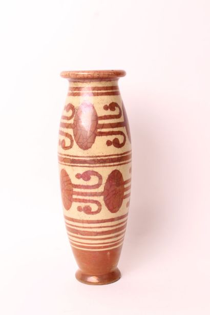 null Spain

Earthenware vase with lustre decoration on a buff background. 

End of...