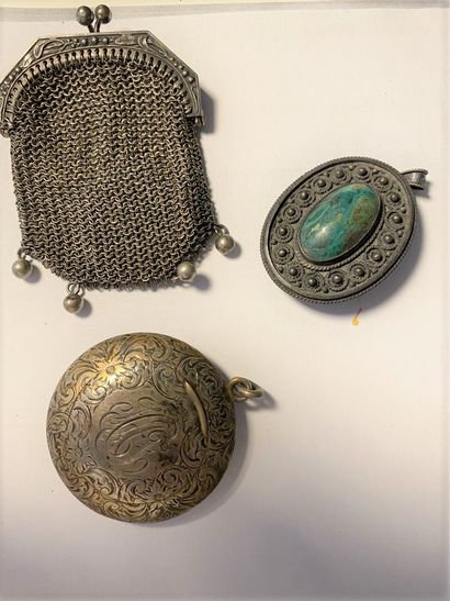 null Silver set including a silver pendant engraved with foliage, a silver brooch...