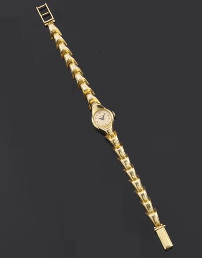 null Bracelet montre de dame en or jaune 750 millièmes, la montre de forme ronde,...