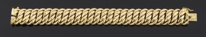 null Bracelet articulé en or jaune 750 millièmes, les maillons double entrelacés...