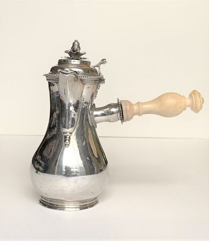 null Baluster coffee pot in plain silver on a threaded bat. The lid is hinged, the...