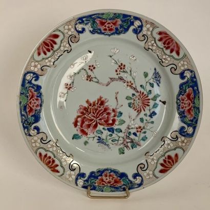 Porcelain plate decorated with Famille Rose...
