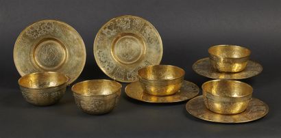 null THAILAND (?) -


Five gilt brass bowls and saucers with engraved decoration....