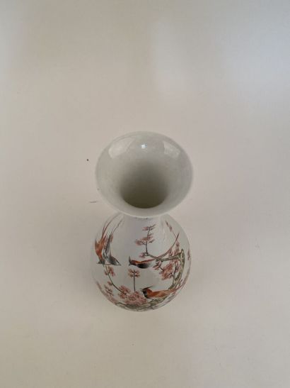 null VASE of form bottle with long collar out of porcelain with polychrome decoration...