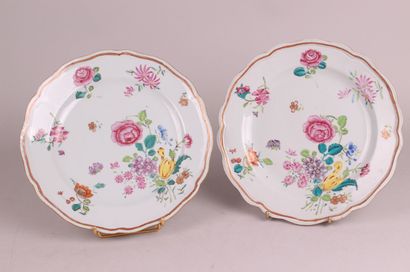 null CHINA


Two porcelain plates with polychrome decoration of off-center flowers.


18th...