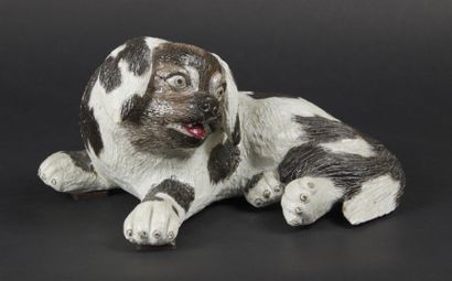 CHINA


Porcelain dog lying down, white and...