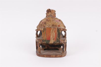 null CHINA, 19th century 


Seated subject in partially polychrome carved wood. 


Height:...