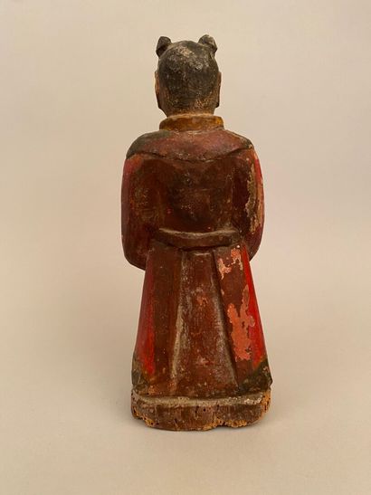 null CHINE, XIXe siècle 


Sculpture en bois peint polychrome, figurant un dignitaire.


H.:...