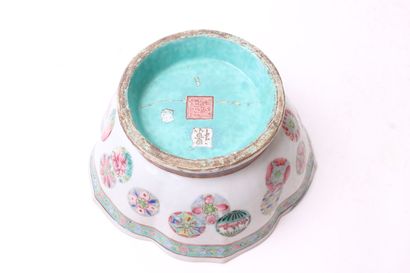 null CHINA 


Porcelain square pocket on a round base decorated with characters and...