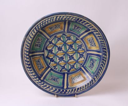 null MOROCCO, 19th century 


Large hollow ceramic dish decorated with blue, green...