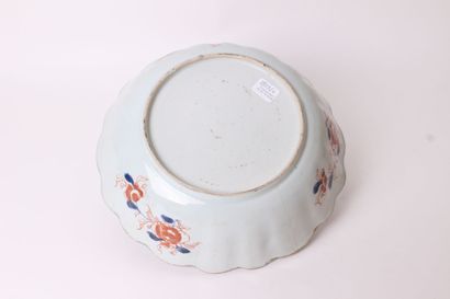 null CHINA 


Porcelain bowl with polychrome decoration of a flowering tree 


18th...