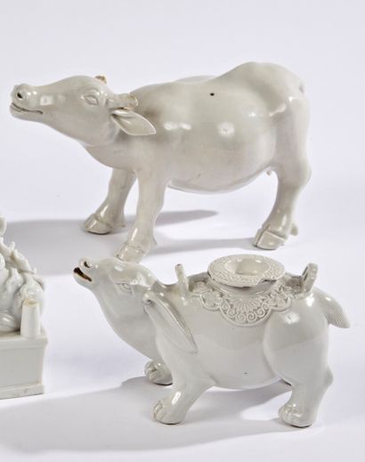 CHINA


Two white porcelain buffaloes, one...
