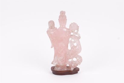 null CHINA


Rose quartz group representing a character holding a vase, accompanied...