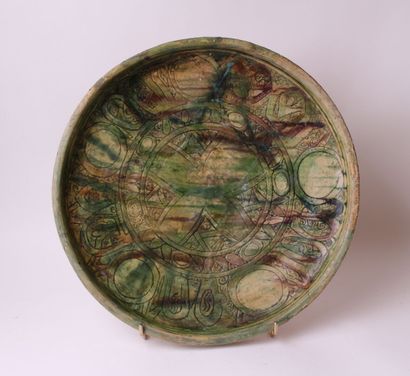 null AFGHANISTAN, 12th century 


Large ceramic dish with three-colored sancai glaze...