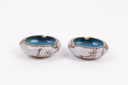 null CHINA, 20th century 


Two small cloisonné enamel ashtrays decorated with cherry...