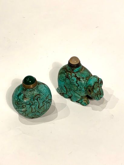 null CHINA - 20th century


Two carved turquoise snuff bottles, one in the shape...