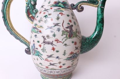 null JAPAN KUTANI, 19th century 


Ewer with two handles in the shape of dragons,...