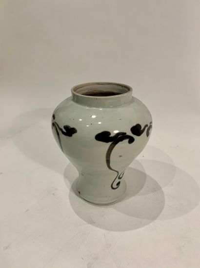 null KOREA (?) 


Porcelain baluster vase with black stylized decoration on a white...