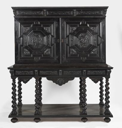 Cabinet in carved ebony and blackened wood,...