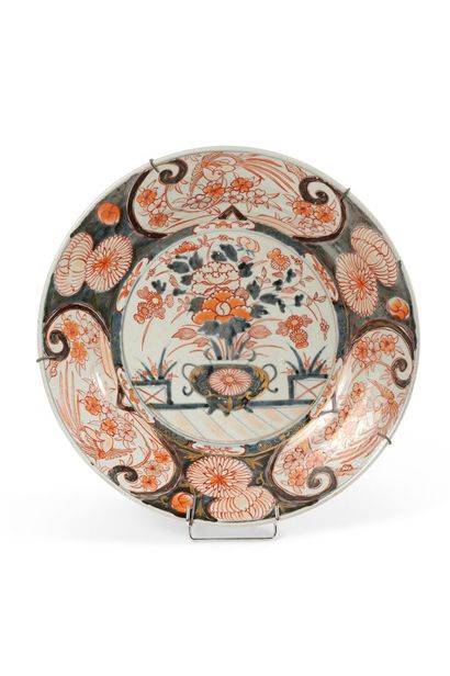 null Japan

Round porcelain dish decorated in blue, red and gold called Imari in...