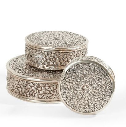 null CHINA

Three silver boxes of round shape with chased and embossed decoration...