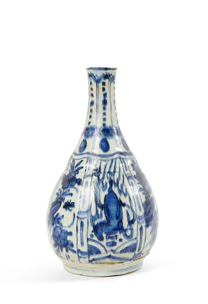 null China

Porcelain bottle vase with blue camaïeu decoration of horses and flowering...