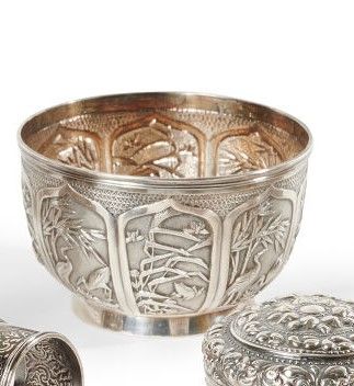null CHINA

A silver cup, chased and embossed, decorated with storks, frogs and butterflies...