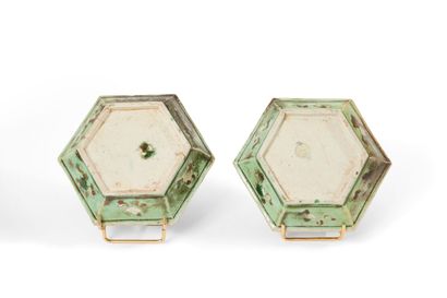 null China

Two octagonal enameled cookie cups decorated in yellow, eggplant and...