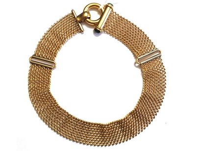 null Necklace large articulated in yellow gold 750 thousandth braided, the clasp...