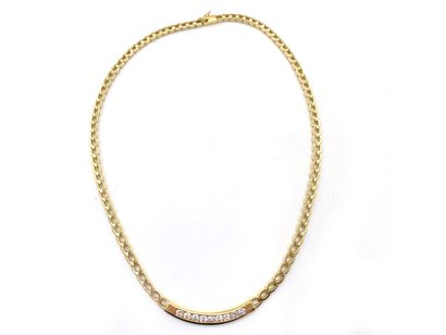 null Articulated necklace in yellow gold 750 thousandth holding in the center a line...