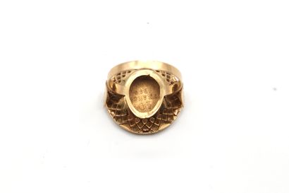 null Ring in yellow gold 750 thousandths decorated in the center of a 10 Francs gold...